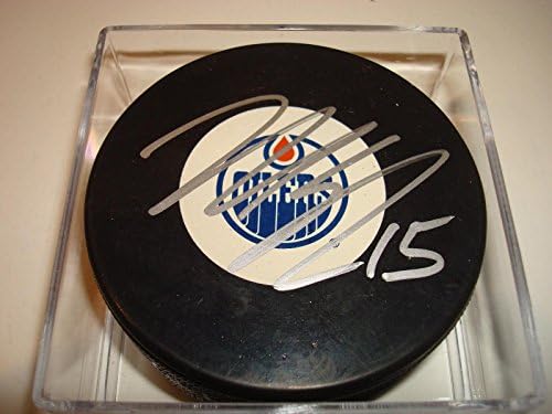 Nick Schultz potpisao je hokejaški pak Edmonton Oilers s potpisom a - NHL Pakovi s autogramima